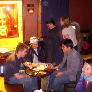 some friends at Bar 821 - notice the TATTOO sign and never miss this place.