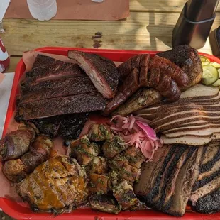 Pork ribs, pork belly, poppers, pulled pork, Turkey, chicken, brisket, both sausages