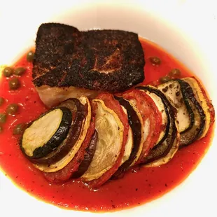 This was a substitute for an allergy, some sort of fish with a ratatouille [tasting menu for private dinner party]