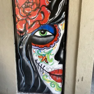 a woman with a rose in her hair