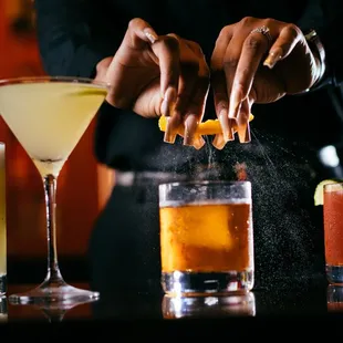 a bartender preparing a cocktail