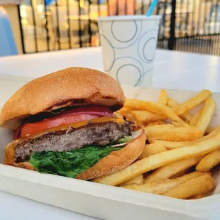 Paradise Burger and Fries ($15) and a Pina Colada Smoothie ($7)
