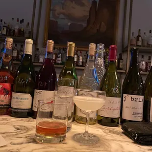 a variety of wine bottles and glasses