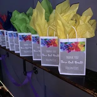 a row of thank you bags