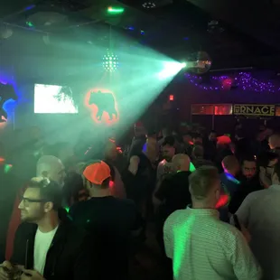 a crowd of people at a party