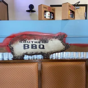 ows a bbq sign on the wall