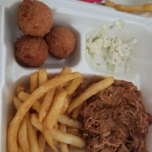 Hush puppies, slaw, fries, pulled pork - no bun.  Perfect vacation food...