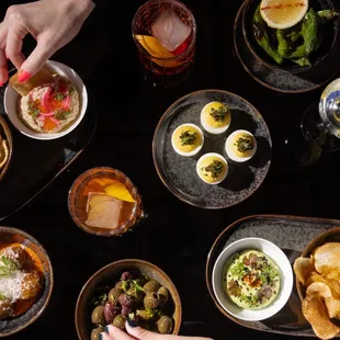 a table full of food and drinks