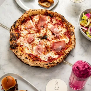 Neapolitan personal pizza
Big enough to share as a snack, small enough to enjoy on your own.
SERVED ALL NIGHT LONG!