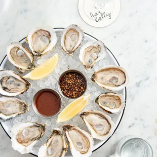 Your choice of east &amp; west coast, accompanied with bloody mary accoutrement and soy ginger mignonette