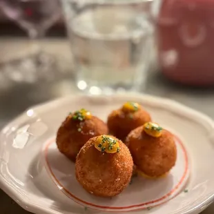 three donuts on a plate