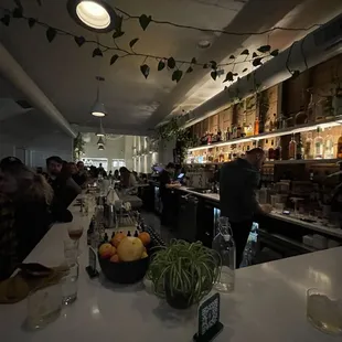 people sitting at the bar