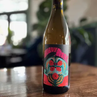 a bottle of wine on a table