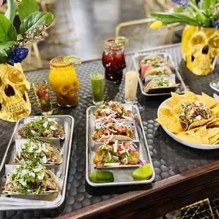 a variety of mexican food on a table