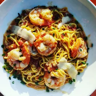 Shrimp scampi with homemade spaghetti, scallions, garlic butter sauce, pecorino chz