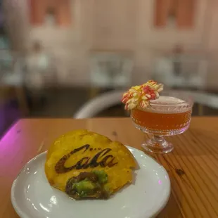 a plate of food and a drink