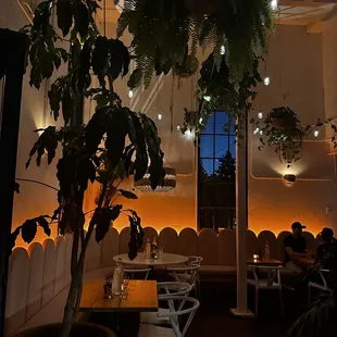 inside area to the left, right when you walk in .