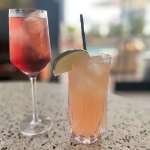 two cocktails on a table