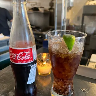 a coke and a glass of coke