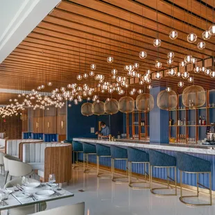 a view of the bar and dining area