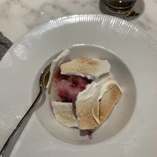 a white plate with a dessert on it