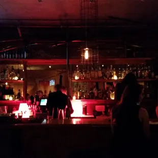 people sitting at a bar