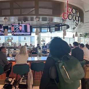 The food and the drinks look good here just waiting for my chance to get to the bar