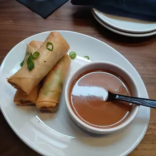 Tasteless vegetable spring rolls that required dipping in the mild peanut ginger sauce for a touch of flavor.