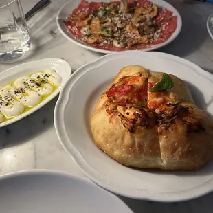 Awesome focaccia with whipped ricotta, lava salt, evoo, and fennel; carpaccio with sunchokes (husband liked)