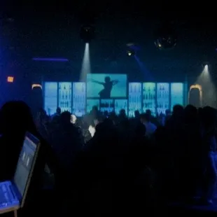 a crowd of people at a nightclub
