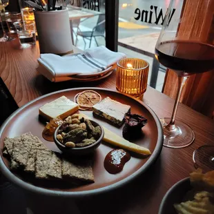 Cheese board of 3 selections, also came with honeycomb, seasoned nuts, crackers, and more.