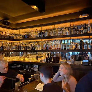 people sitting at the bar