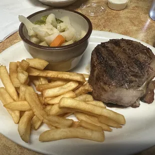 Filet, fries, steamed veggies