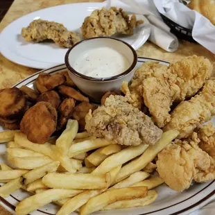 Chicken strips french fries fried squse awesome  lunch looks good AND taste good . Delicious