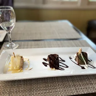 three desserts on a plate