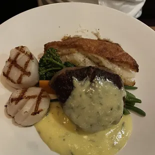 Fillet with goat cheese au gratin potatoes. Added a side of scallops.