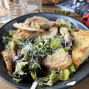 Caesar salad with chicken.  Tasty and chicken was full of flavor.