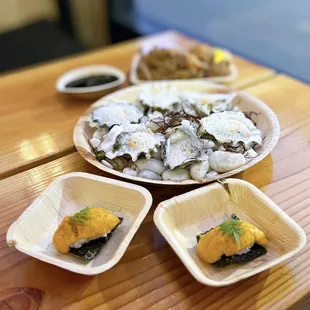 Uni w/ sushi rice, crispy nori, uni bottarga ($8 each), Raw oysters w/ sake foam, gooseberry (1/2 dozen-$24), Karaage w/ black curry ($16)