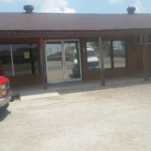 a red truck and a white van