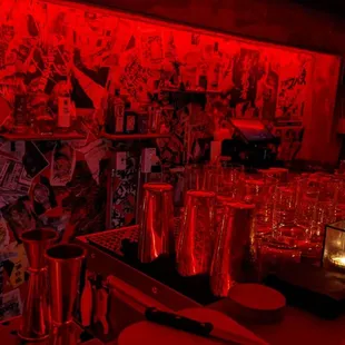 a bar with red lighting