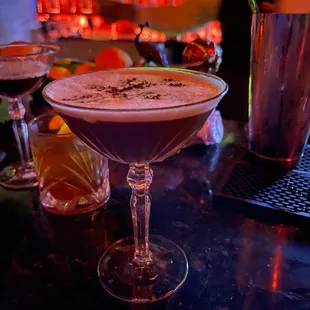 two cocktails on a bar counter