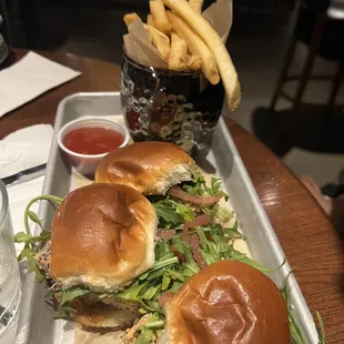 Salmon sliders with fries. So moist and delicious order this!