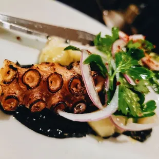 a plate of food and a knife