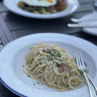 Bucatini carbonara and duck confit hash