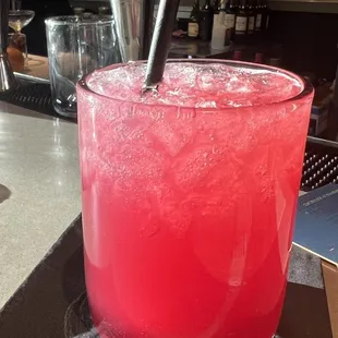 a drink in a glass with a straw