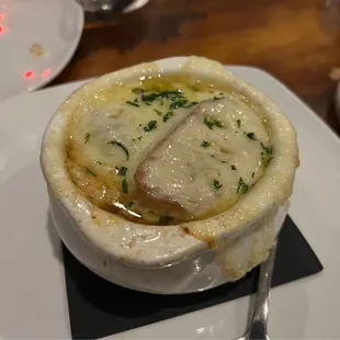 a bowl of soup on a plate