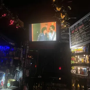 two men on a screen