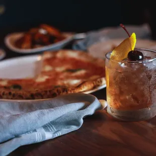 a drink and a plate of food