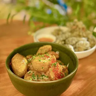 Potato Tostones w/ kumquat kosho, salmon roe, chive | $12