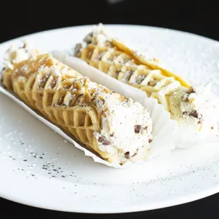 two ice cream sandwiches on a white plate